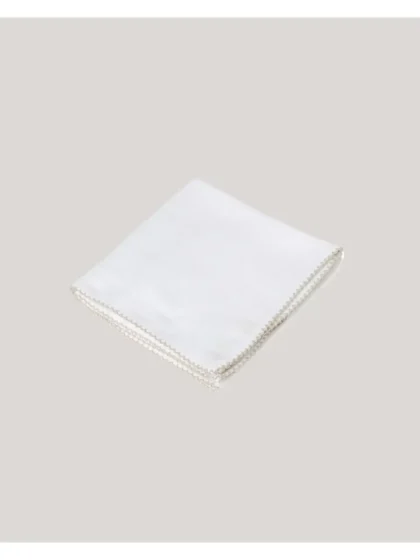 Muselina con ribete color avena