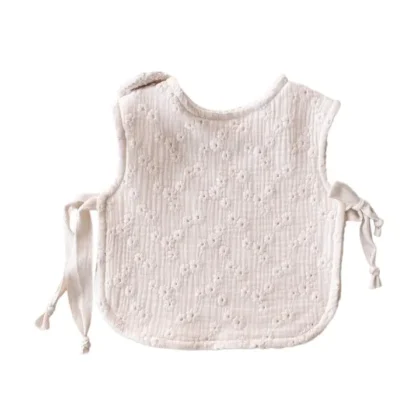 Babero bordado ajustable para bebé y niña pequeña  color crudo